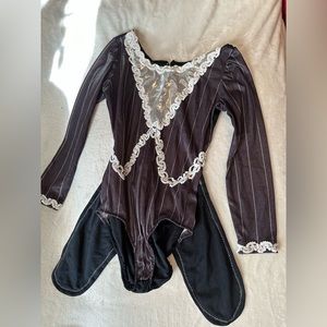 Black dance/gym leotard/bodysuit long sleeve. Sequined lined on parts.